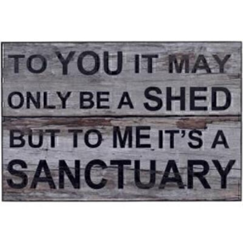 Shed Sanctuary Sign by Transomnia. Wooden sign with wood effect print with the saying 'To you it may only be a shed but to me it’s a sanctuary' Great gift for a gardener or great gift for a man. Size 30x20x1cm